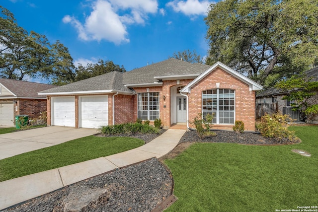 ranch-style house featuring a garage and a front lawn