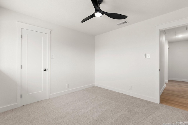 unfurnished room featuring carpet flooring and ceiling fan