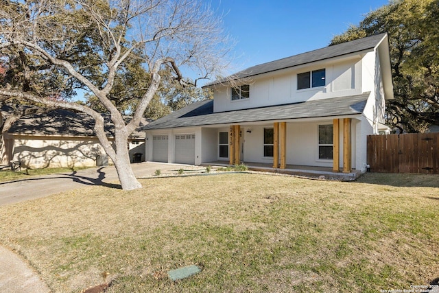 view of front of property featuring a garage, a porch, and a front lawn