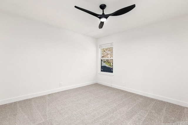 unfurnished room featuring ceiling fan and carpet flooring