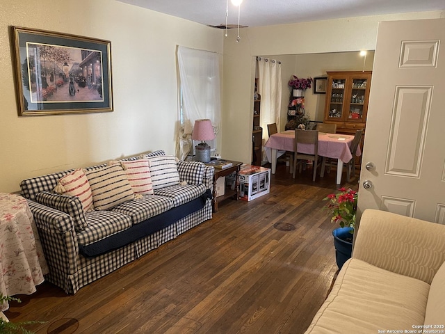 living room featuring dark hardwood / wood-style floors