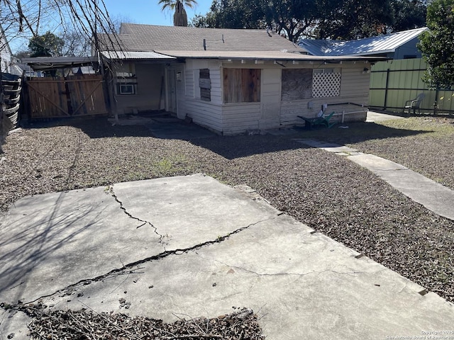 rear view of house with a patio area