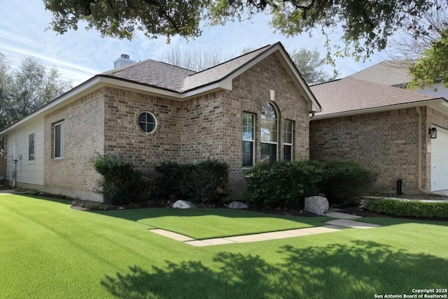 exterior space with a front yard