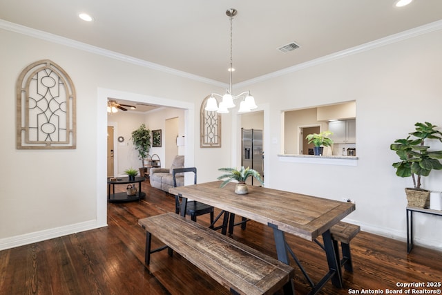 dining area with dark hardwood / wood-style flooring, ceiling fan, and ornamental molding