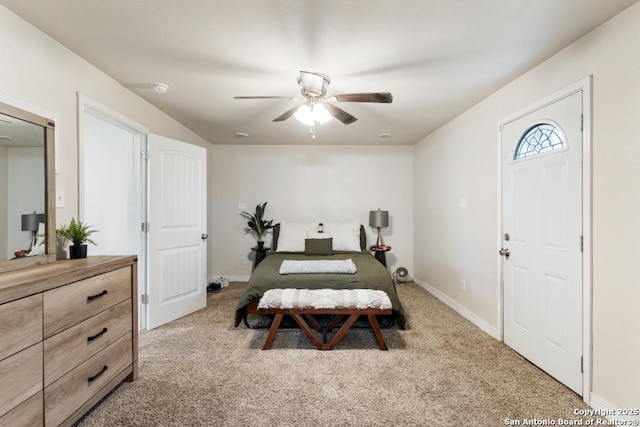 carpeted bedroom featuring ceiling fan