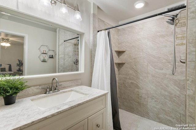 bathroom with vanity and a shower with shower curtain