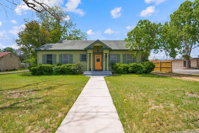 view of front of home with a front yard