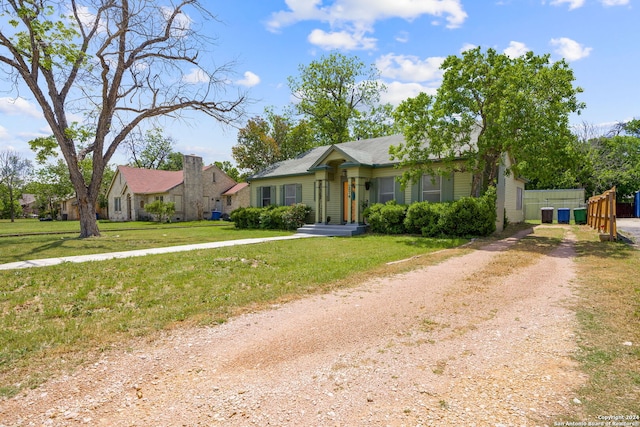 ranch-style house with a front yard