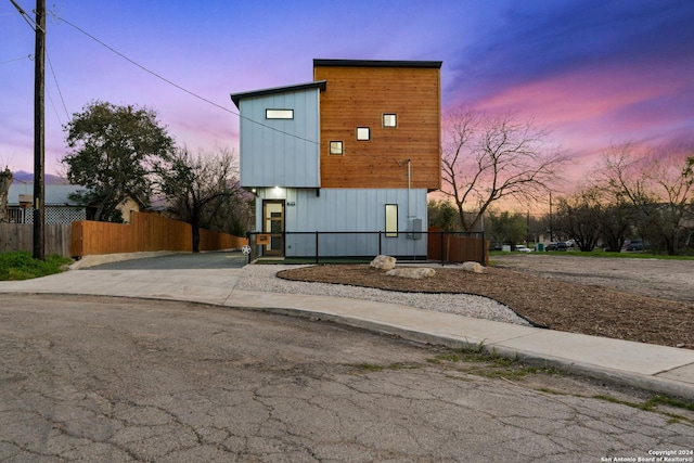 view of property exterior at dusk