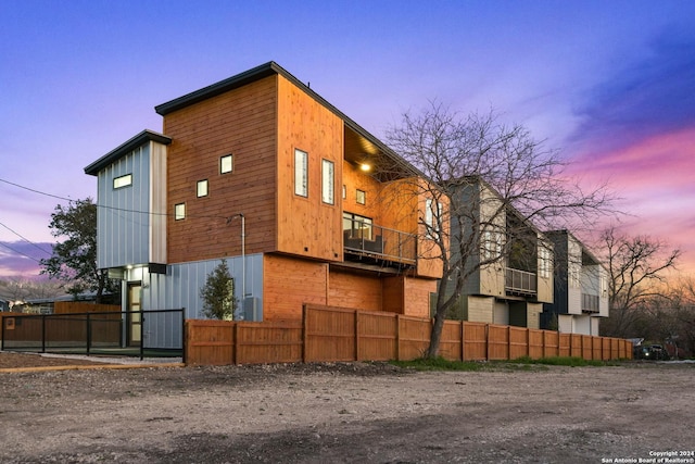 view of property exterior at dusk