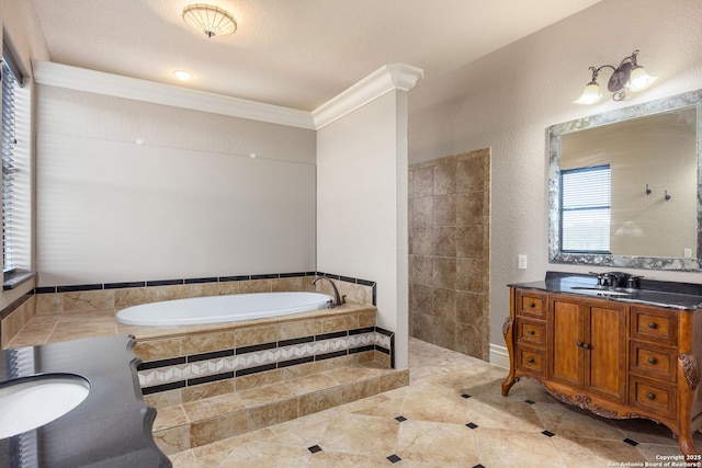 bathroom featuring vanity, ornamental molding, a relaxing tiled tub, and tile patterned flooring