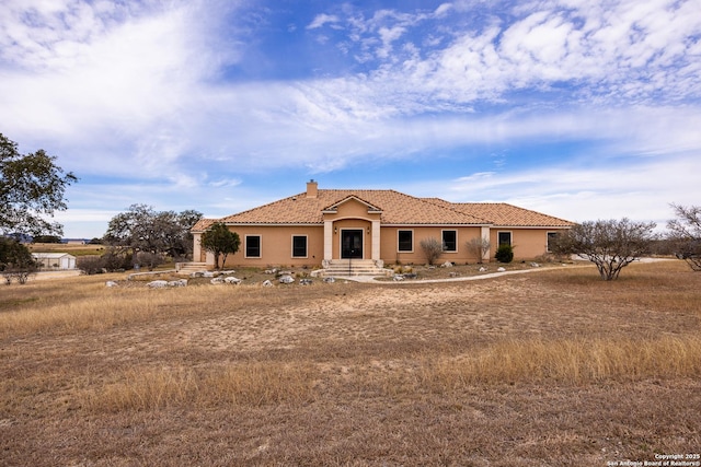 view of mediterranean / spanish house