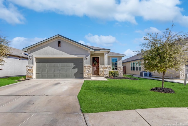 view of front of property featuring a garage, central air condition unit, and a front yard