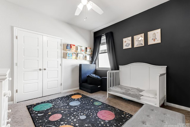 bedroom with carpet flooring, a closet, and ceiling fan