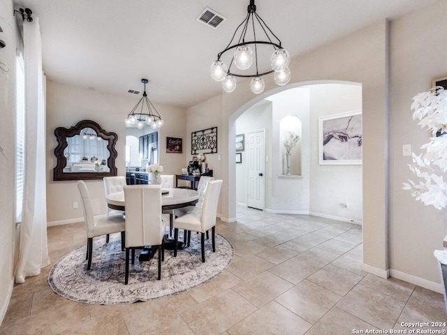 dining space with light tile patterned floors