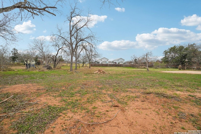 view of yard with a rural view