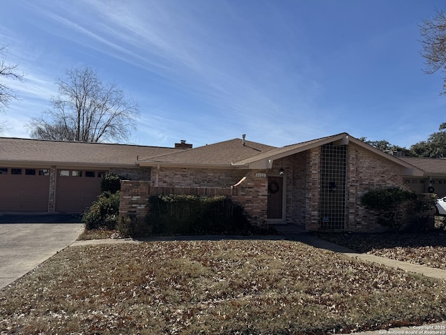 single story home featuring a garage