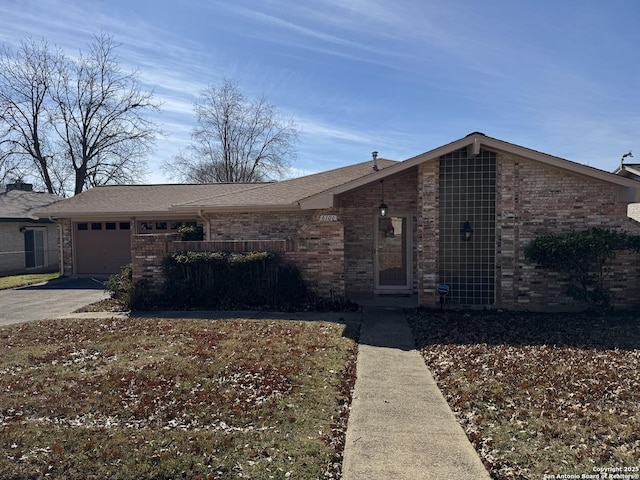 single story home featuring a garage