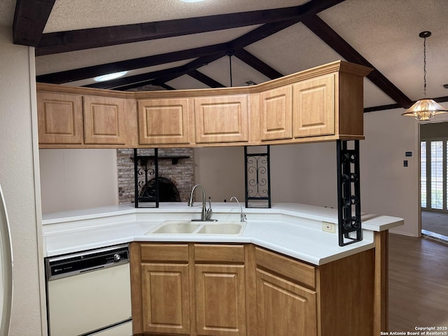 kitchen featuring dishwasher, decorative light fixtures, sink, kitchen peninsula, and lofted ceiling with beams