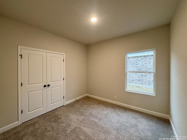 spare room with carpet flooring