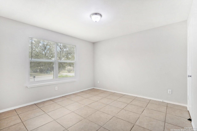 view of tiled spare room