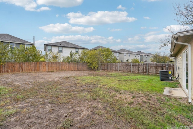 view of yard featuring central AC