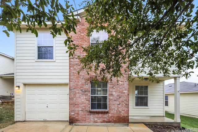 exterior space with a garage