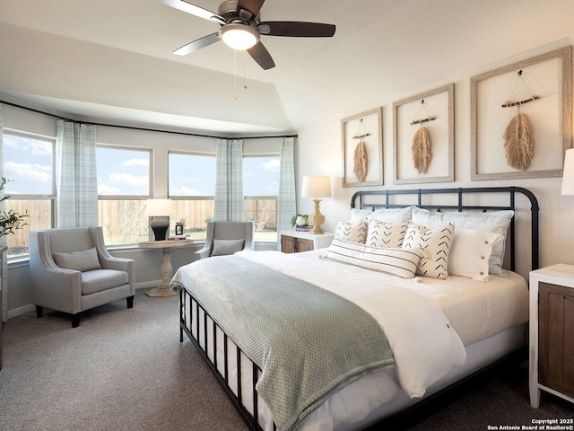 carpeted bedroom featuring ceiling fan and lofted ceiling