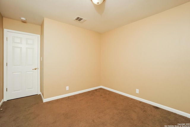 empty room with carpet flooring