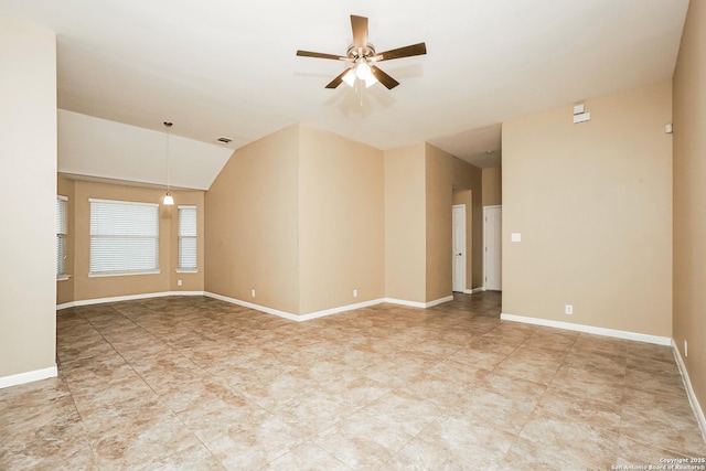 unfurnished room with ceiling fan and lofted ceiling