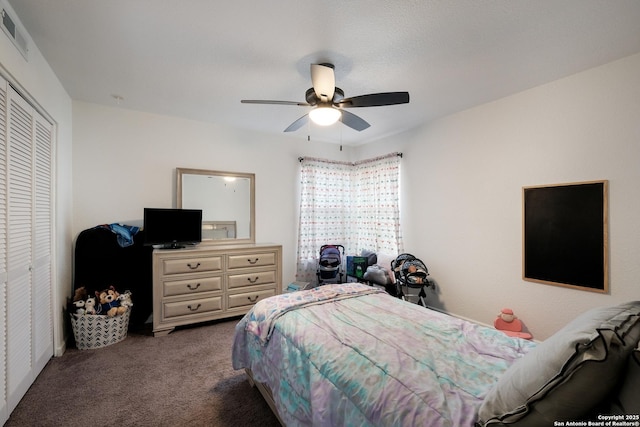 carpeted bedroom with a closet and ceiling fan