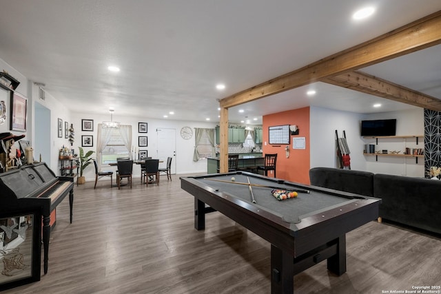 game room featuring wood-type flooring, beamed ceiling, and billiards