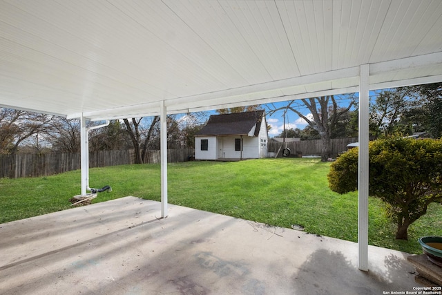 view of yard with a patio area and an outdoor structure