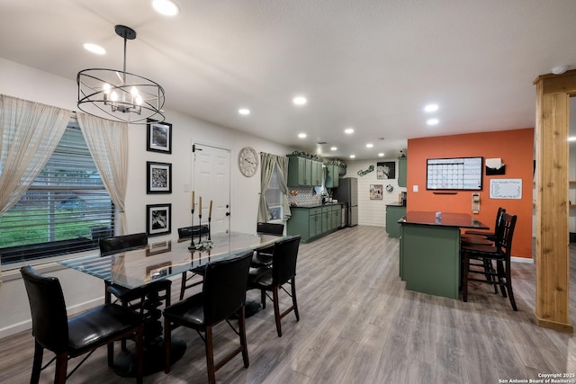 dining space featuring hardwood / wood-style floors