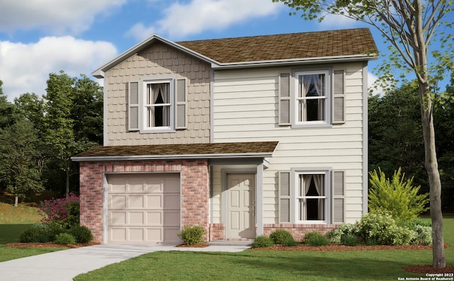 view of front of property featuring a garage and a front yard