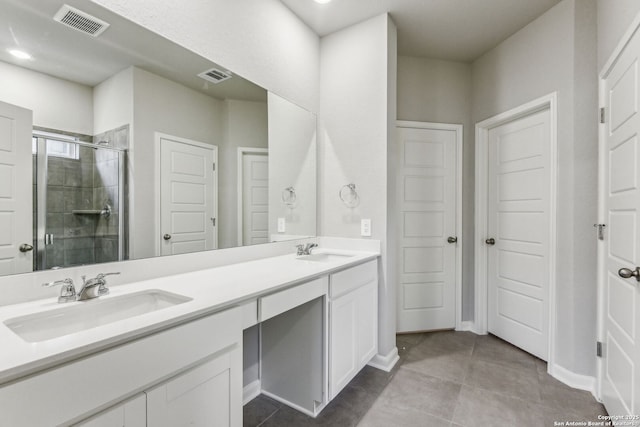 11559 Cottage Pt, San Antonio, TX 78254 - bathroom featuring walk in shower, vanity, and tile patterned flooring