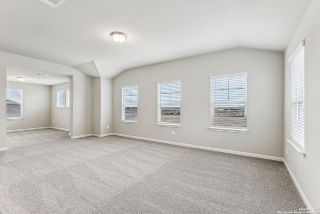 11559 Cottage Pt, San Antonio, TX 78254 - carpeted empty room with vaulted ceiling