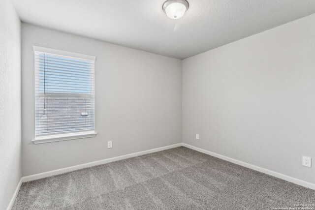 11559 Cottage Pt, San Antonio, TX 78254 - spare room with carpet