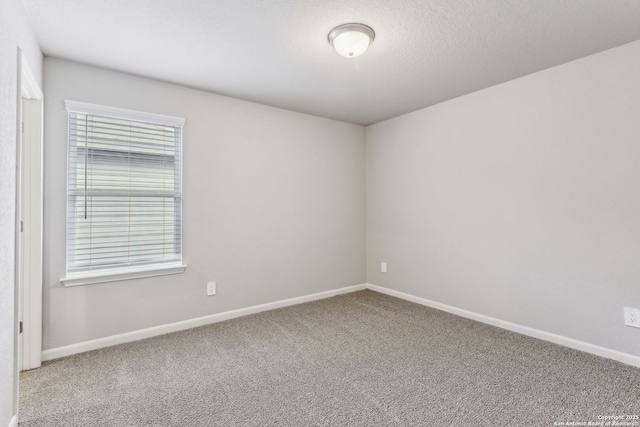 11559 Cottage Pt, San Antonio, TX 78254 - carpeted empty room featuring a textured ceiling
