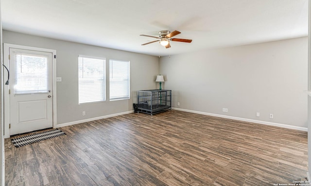 entryway with ceiling fan and dark hardwood / wood-style floors