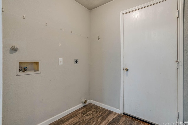 washroom featuring washer hookup, electric dryer hookup, and dark hardwood / wood-style flooring