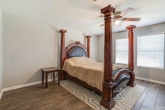 bedroom with ceiling fan and dark hardwood / wood-style flooring