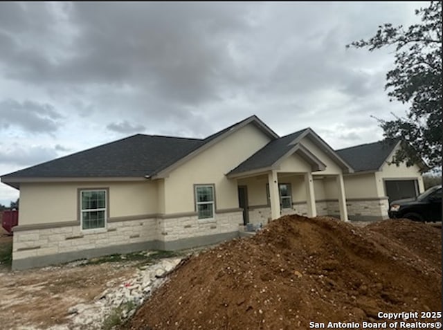 view of front of home with a garage