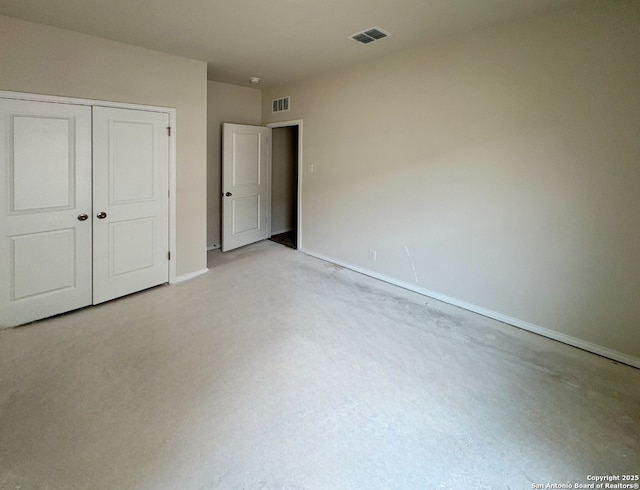 unfurnished bedroom featuring a closet