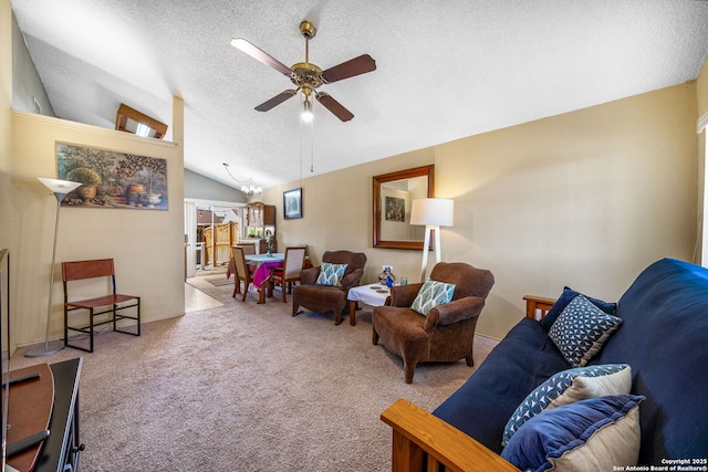 living room featuring light carpet, a textured ceiling, lofted ceiling, and ceiling fan