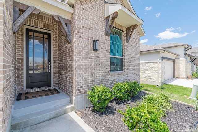 entrance to property with a garage