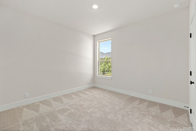 view of carpeted spare room