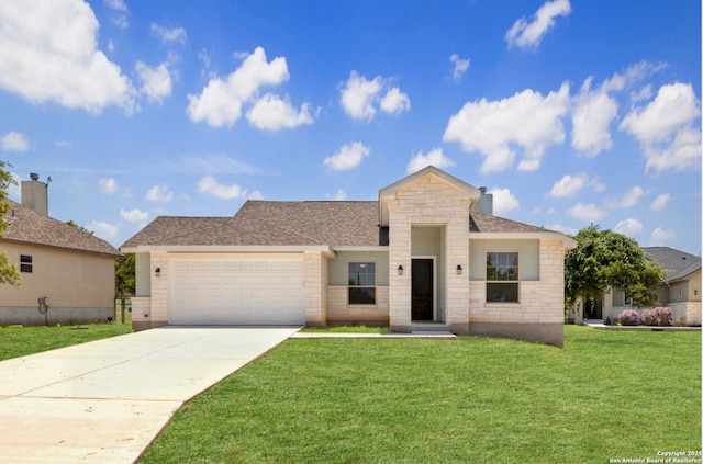 view of front of home featuring a garage and a front lawn