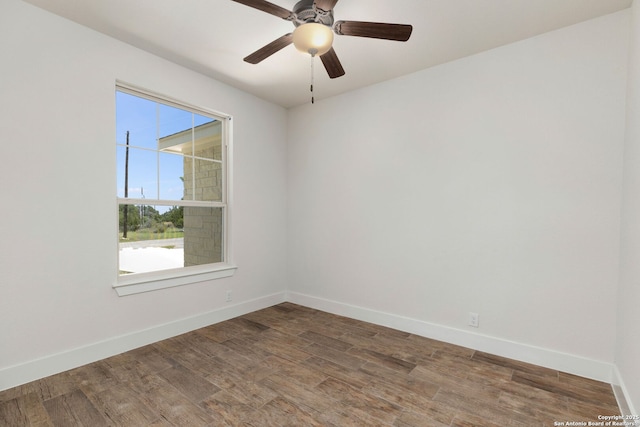 empty room with hardwood / wood-style flooring and ceiling fan