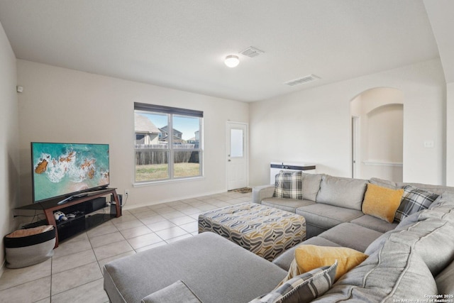 living room with light tile patterned floors